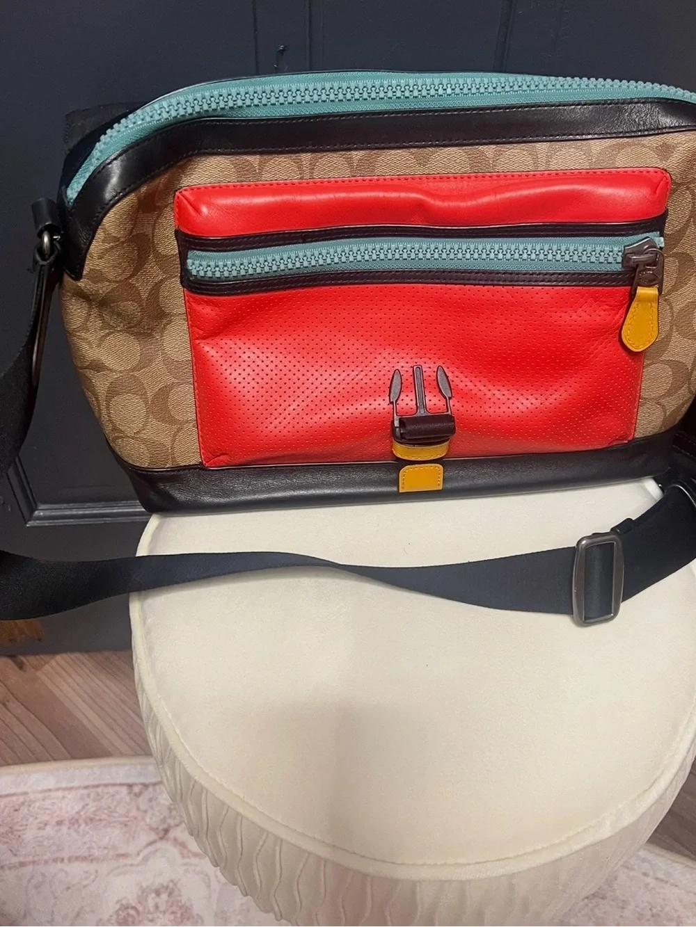 Coach Black Leather Messenger Bag with Red and Yellow Accents
